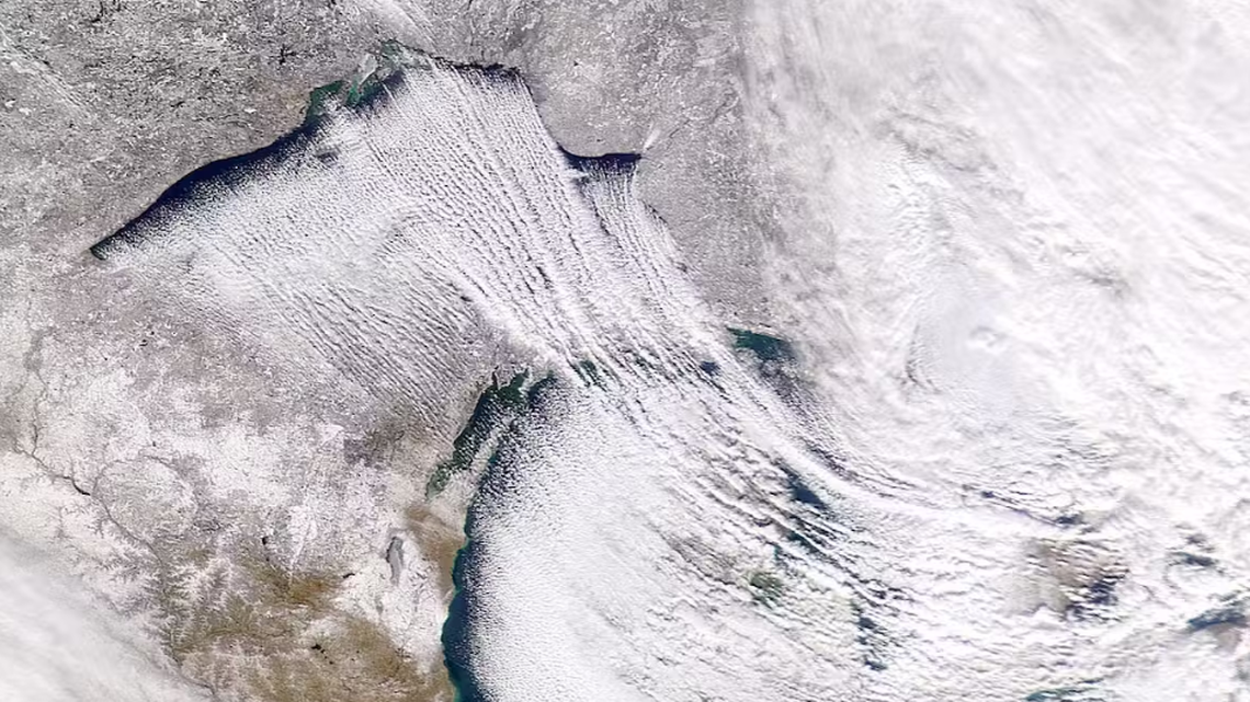 A lake-effect snowstorm in 2020 shows how cold, dry air passing over the Great Lakes picks up moisture and heat, becoming snow on the other side. 