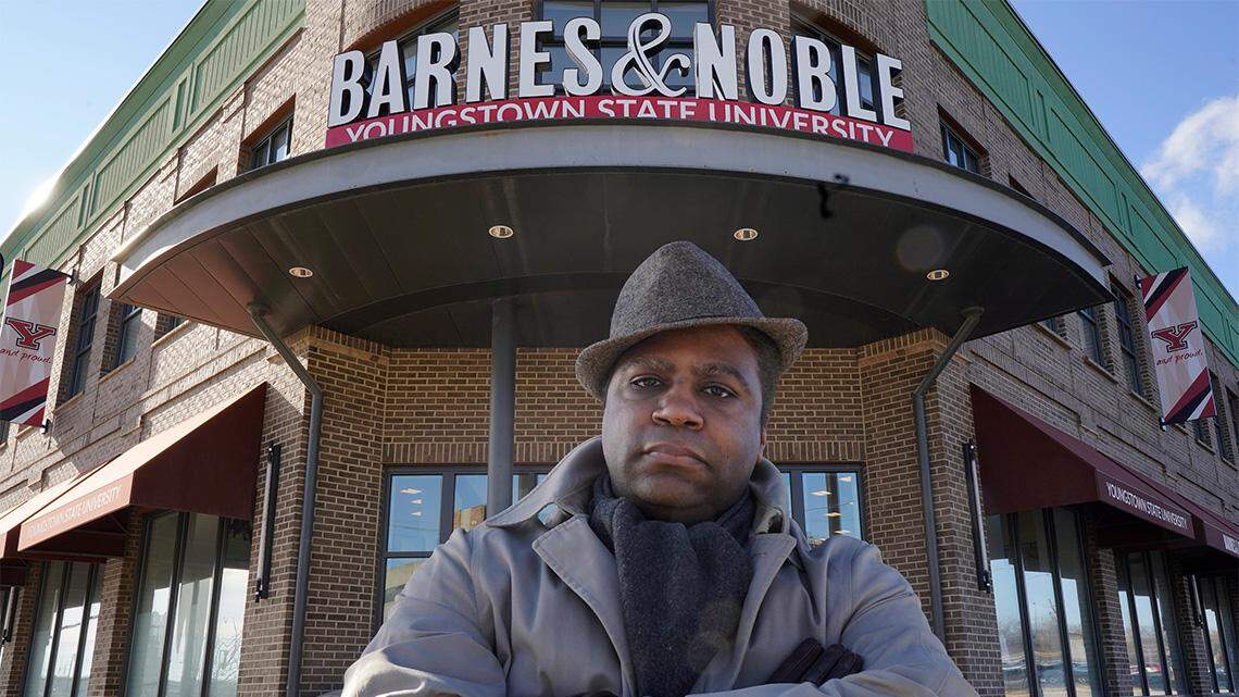 In this Jan. 21, 2021, file photo, Andre Brady poses for a photo outside the Barnes & Noble in Youngstown.