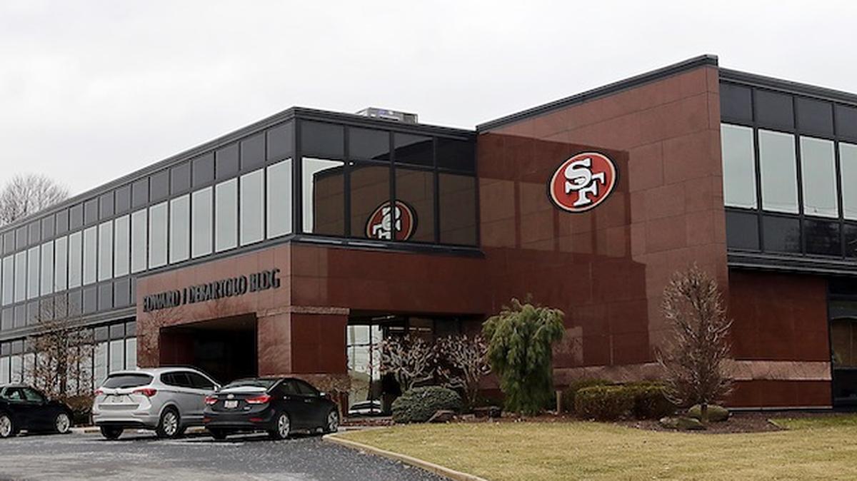 The DeBartolo Corp., 7620 Market St., Boardman, features three flag poles out front which display the U.S. flag, the state of Ohio flag and and a San Fransisco 49ers flag. It is also marked by a 49ers emblem. (Bob Yosay/Mahoning Matters)
