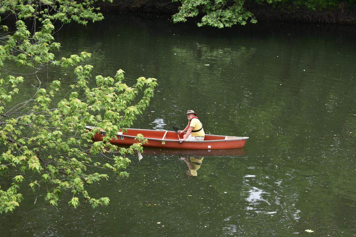 A canoe rider takes part in Riverfest.