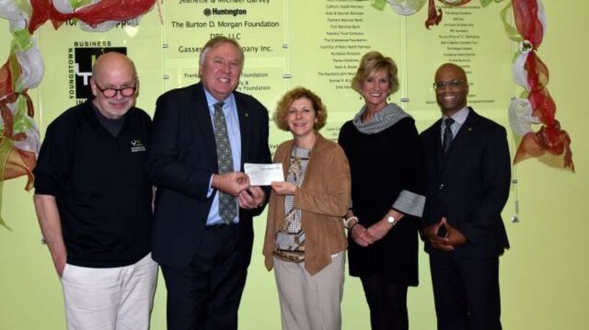 From left are James Cossler, Huntington Bank entrepreneur in residence; William Shivers, regional president of Huntington Bank Canton and Mahoning Valley; Barb Ewing, CEO of the Youngstown Business Incubator; and Sandy Upperman and Barãta Bey of Huntington Bank. (Contributed photo)
