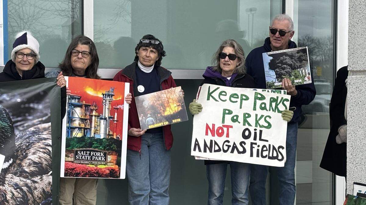 People opposed to fracking protest in front of the Ohio Department of Public Safety building before a Ohio Oil and Gas Land Management Commission meeting.