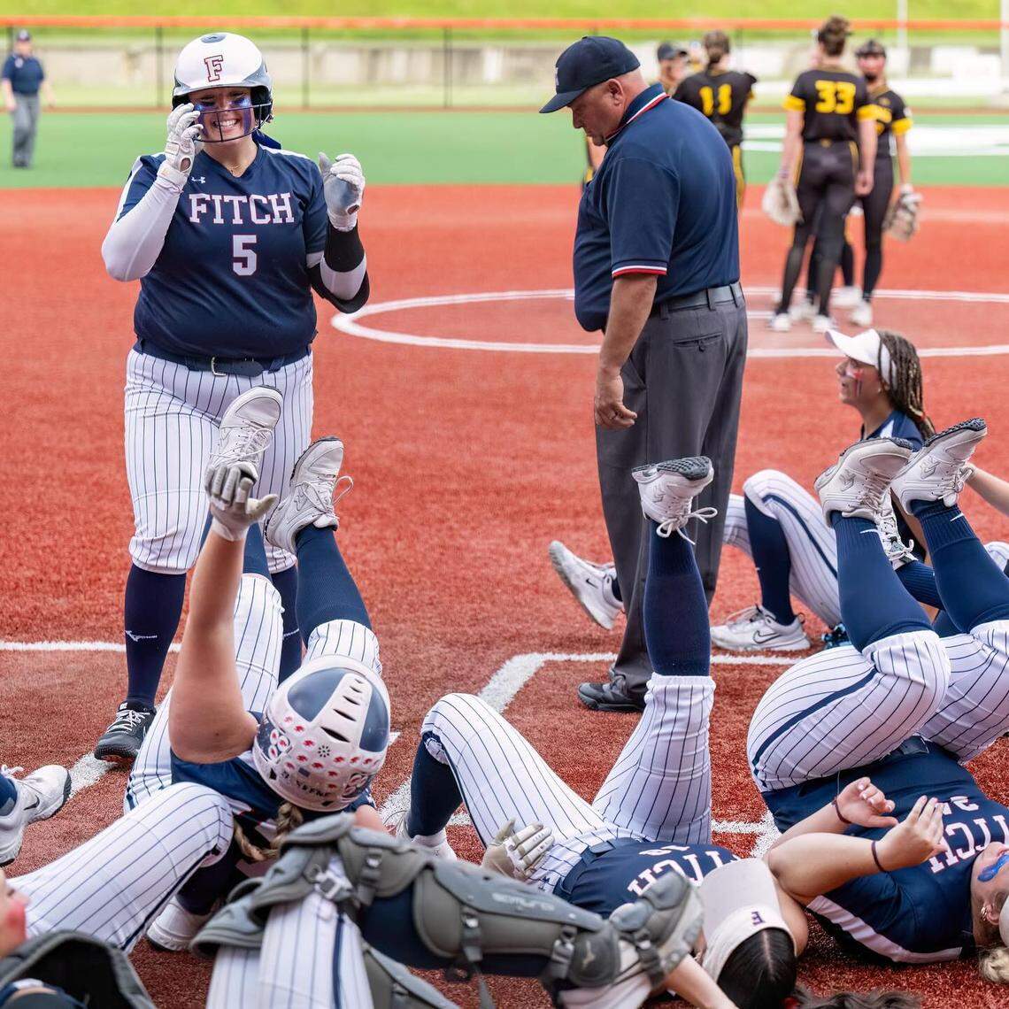 Fitch&nbsp;pitcher Sydnie&nbsp;Watts watches his team doing the “shockwave” celebration after her home run Saturday against Watkins Memorial.
