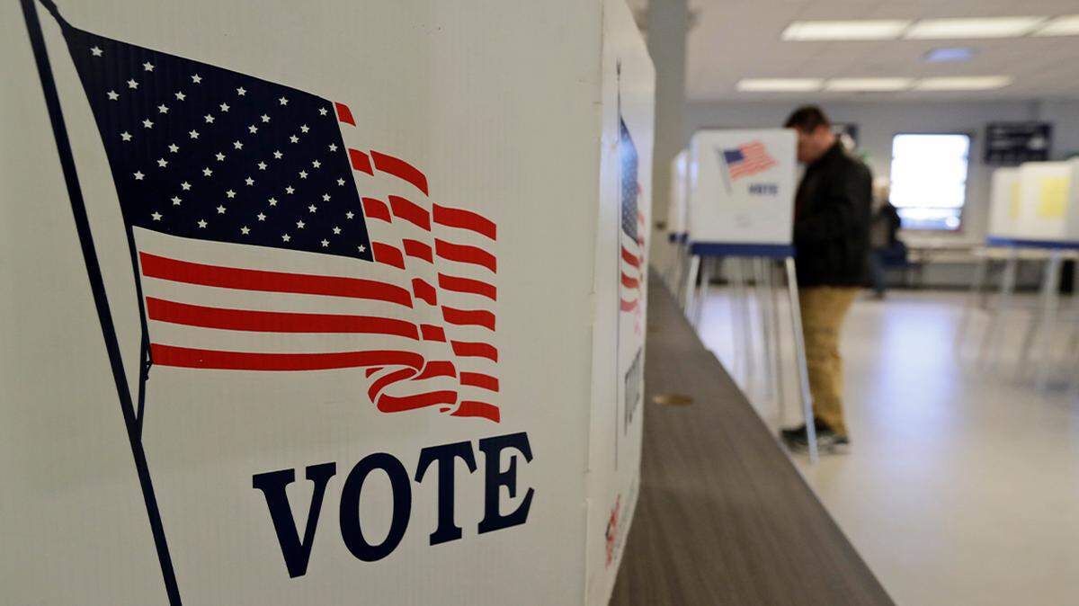 A man votes during early voting March 13, 2020, in Cleveland. Despite the uncertainty raised over the date of Ohio’s primary, the state is ready to move forward with early voting Tuesday ahead of a likely May 3 contest for statewide and congressional races — but not legislative ones.