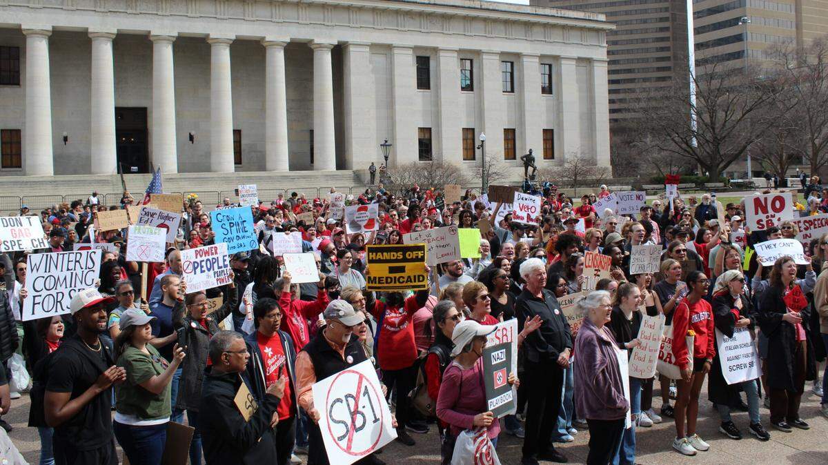 Ohio college students and protesters rally at the Statehouse on March 19, 2025, against Senate Bill 1, a higher education overhaul that bans diversity efforts and faculty strikes, and sets rules around classroom discussion, among other things. 