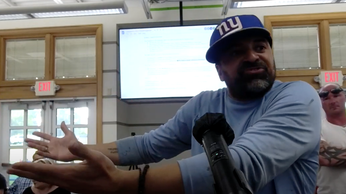 Poland parent Gus Kantaras speaks out against a schoolwide mask rule at a school board meeting Monday. 