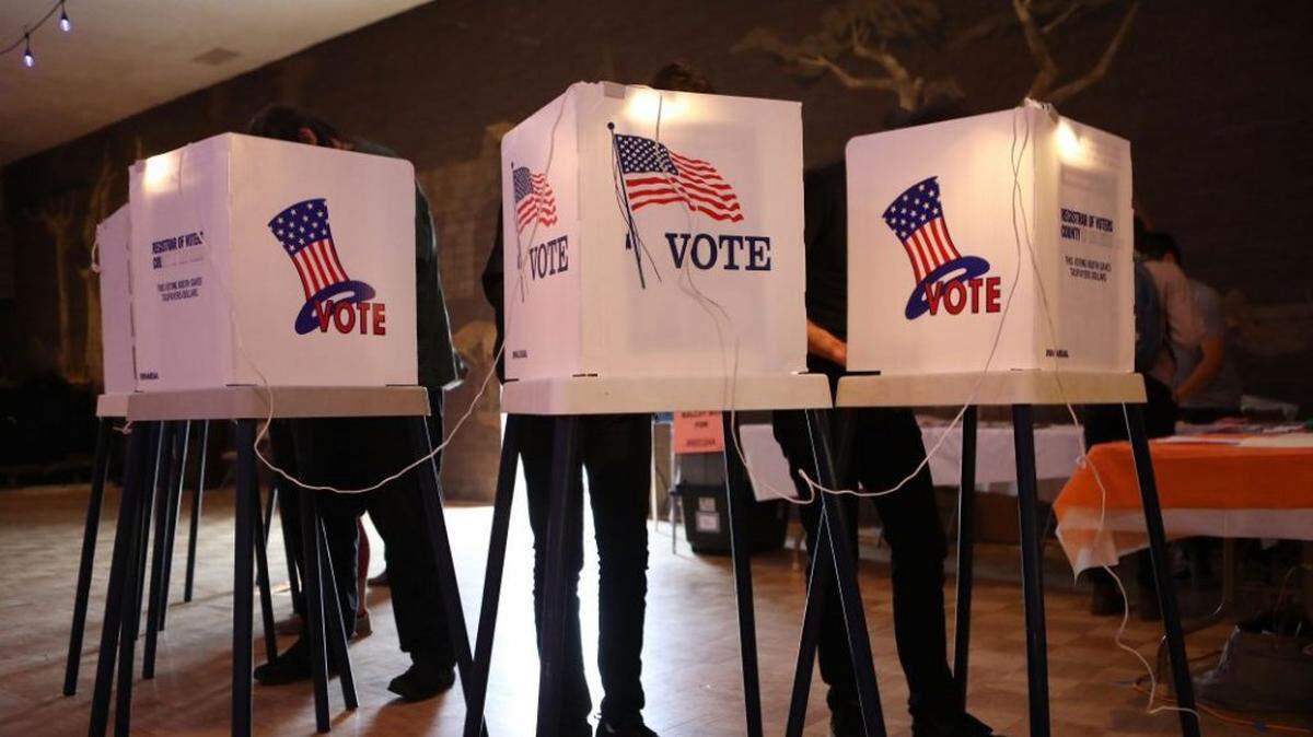 Voters casting ballots.