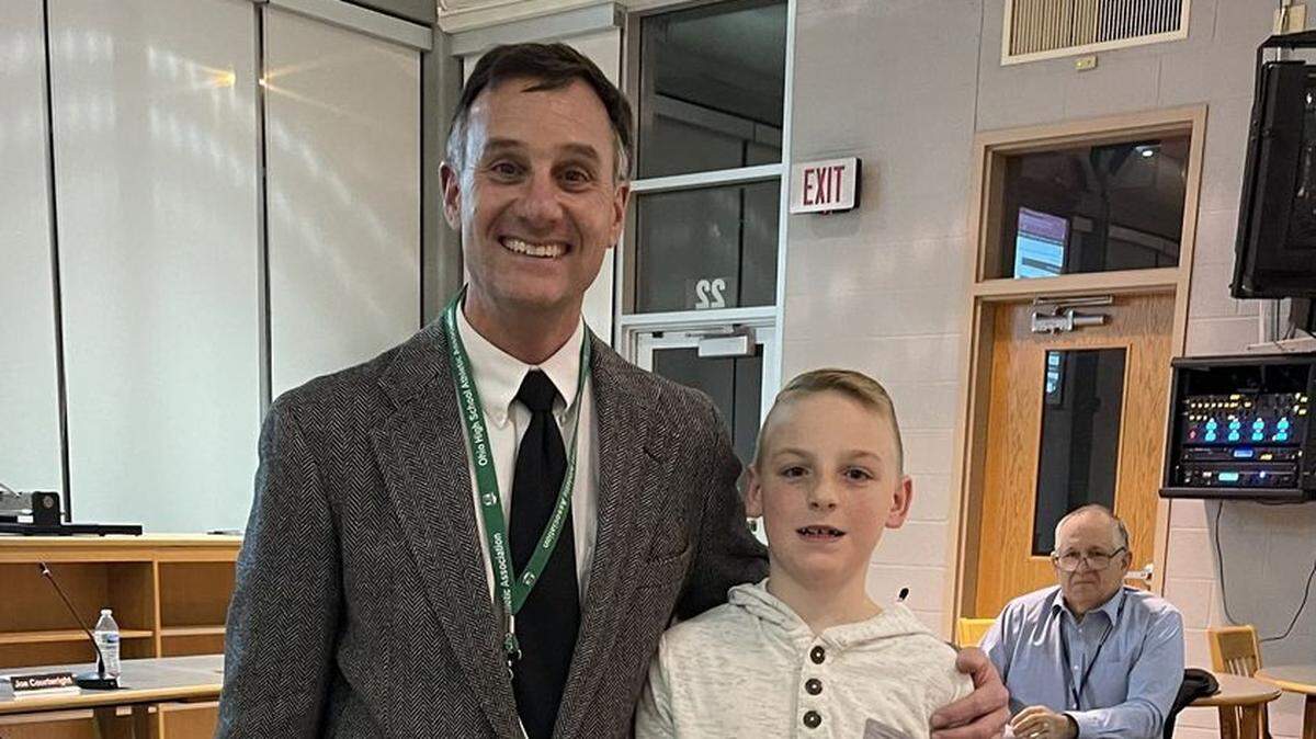 Fritz Schlueter, West Branch Intermediate School Principal, with fourth-grade student Liam Granger, the West Branch Board of Education’s honored student for November.