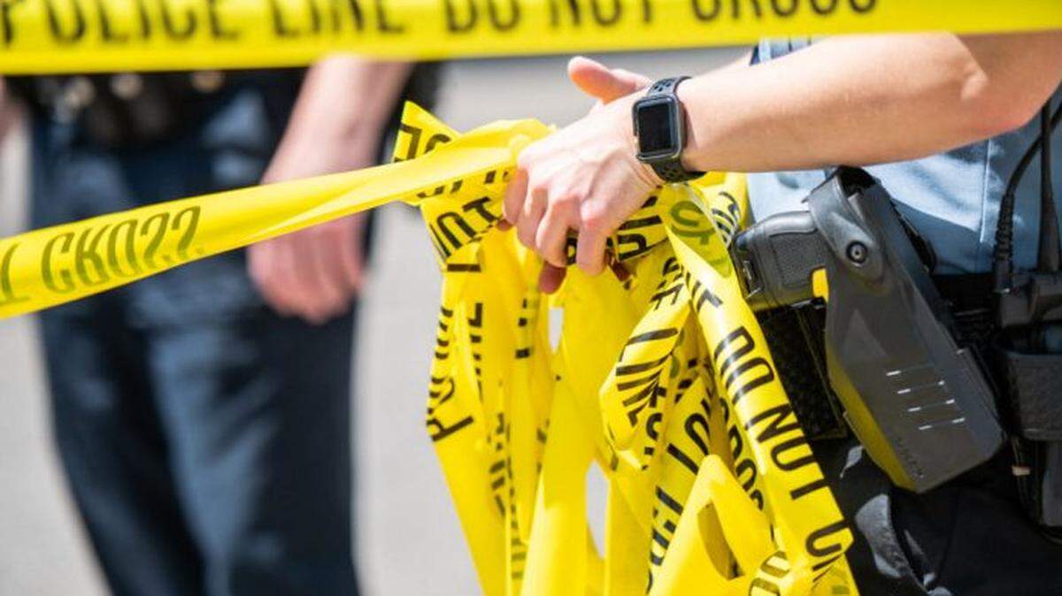 Police tape at a crime scene.