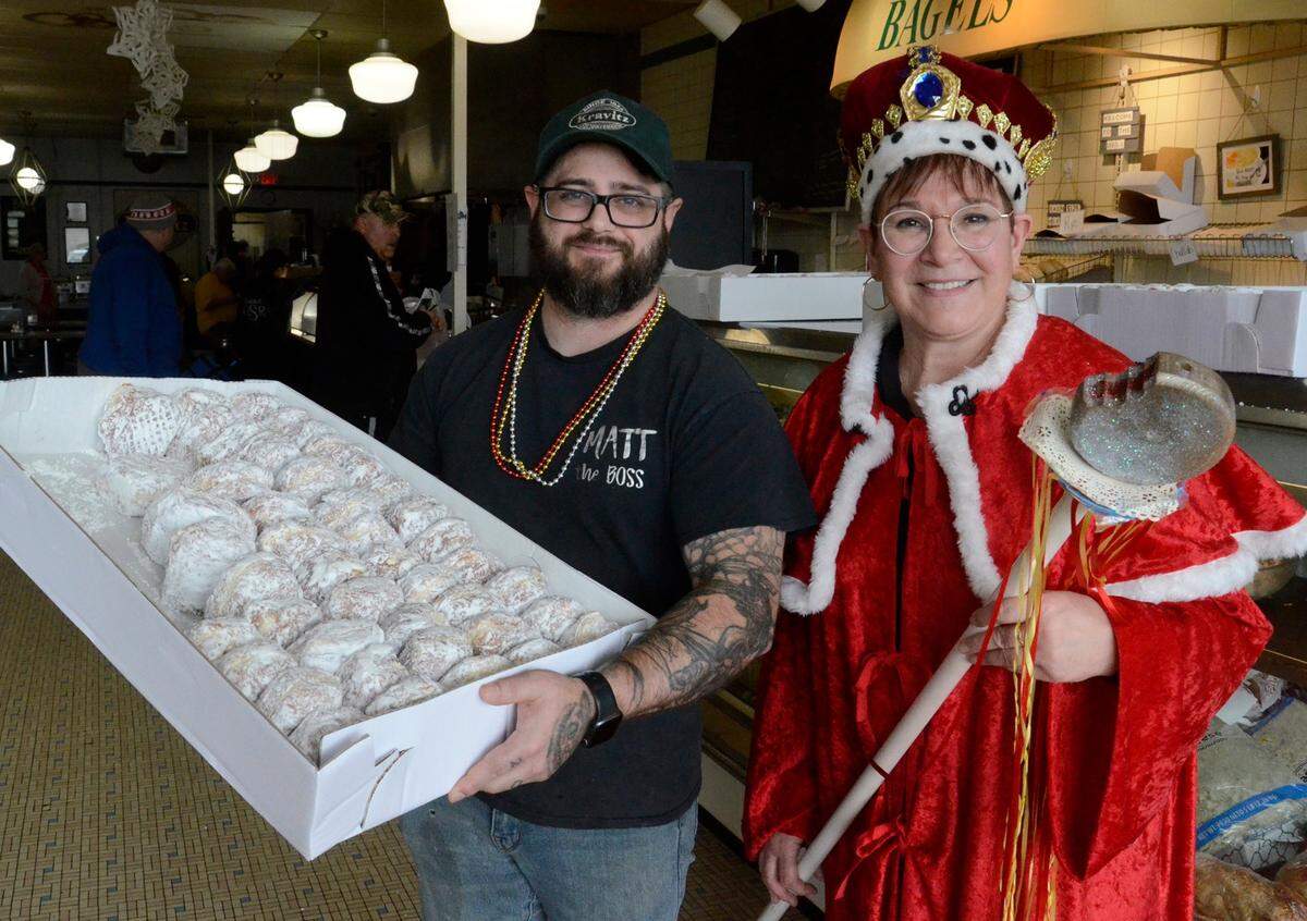 Matthew Rydarowicz, owner of Kravitz Deli, and Aundréa Cika Heschmeyer at Polkas, Pączki and Piwo party.