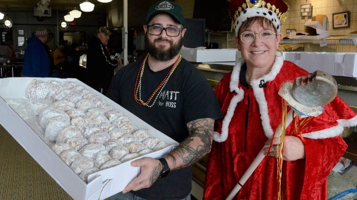 Matthew Rydarowicz, owner of Kravitz Deli, and Aundréa Cika Heschmeyer at Polkas, Pączki and Piwo party. 