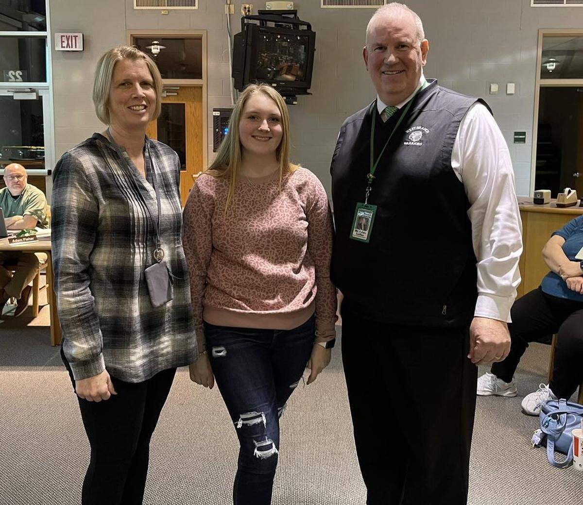 January’s board-honored student Olivia Greeneisen, center, with West Branch High School Assistant Principal Penny DeShields, left, and Principal Brian Coffee, right.