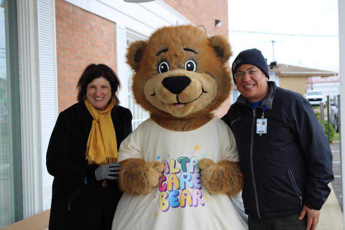 Dr. Elana Rossi, Buddy the Alta Care Bear and Mario Morelos, Akron Children’s External Affairs