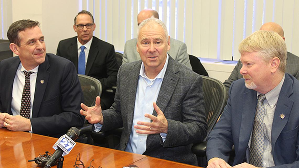 Steve Burns, Lordstown Motors Corp. CEO, center, is flanked by State Sens. Mike Rulli of Salem, R-33rd, and Sean O'Brien of Bazetta, D-32nd, during a press conference Nov. 14, 2019 at Lordstown Motors Corp.'s new headquarters, the former General Motors Lordstown Assembly Complex.