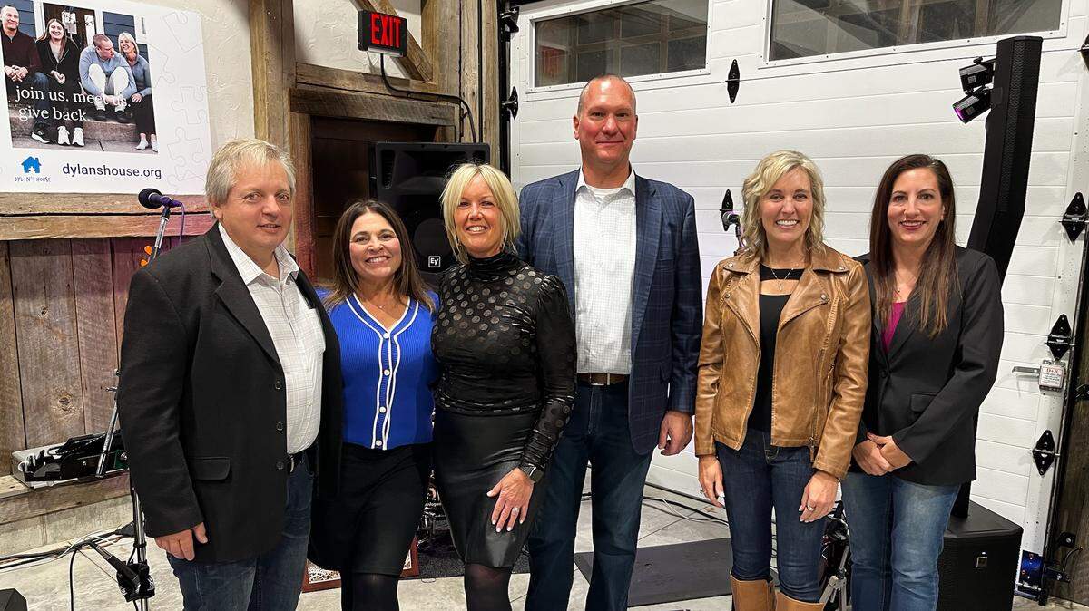 Dylan’s House donors raised over $14,000 to build two new homes in Boardman and Struthers to expand housing to support people with autism. (left to right) Mark Ramunno, President of HBA; Trisha Howe, Executive Director of HBA; Amy Shope, Dylan’s House Vice President; Kevin Shope, Dylan’s House President; Dawn Ochman, President of DAWN Incorporated; Catherine Cercone Miller, Mayor of Struthers.