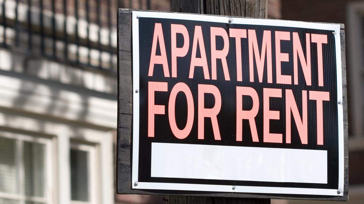A for-rent sign is shown in this stock photo.