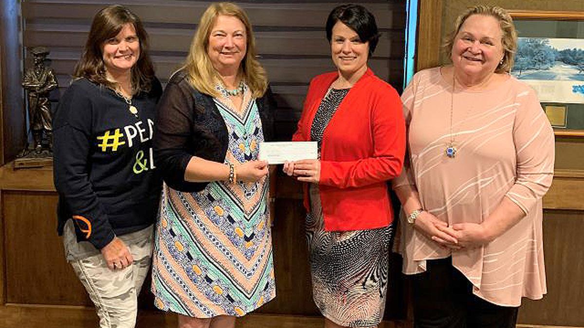 From left, Elizabeth Roller, Mahoning County Medical Society Alliance treasurer; Carol Sankovic, alliance president; Crystal Eckman, Rescue Mission of the Mahoning Valley ambassador; and Susan Berny, alliance secretary. (Contributed photo)