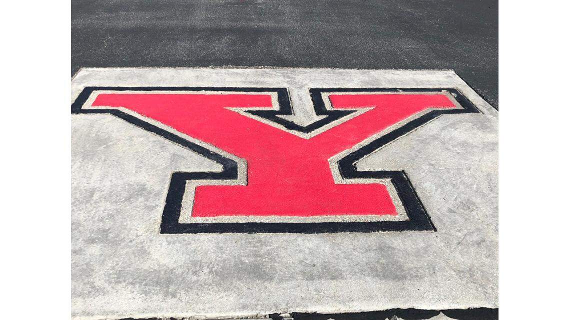 Youngstown State University logo on a sidewalk