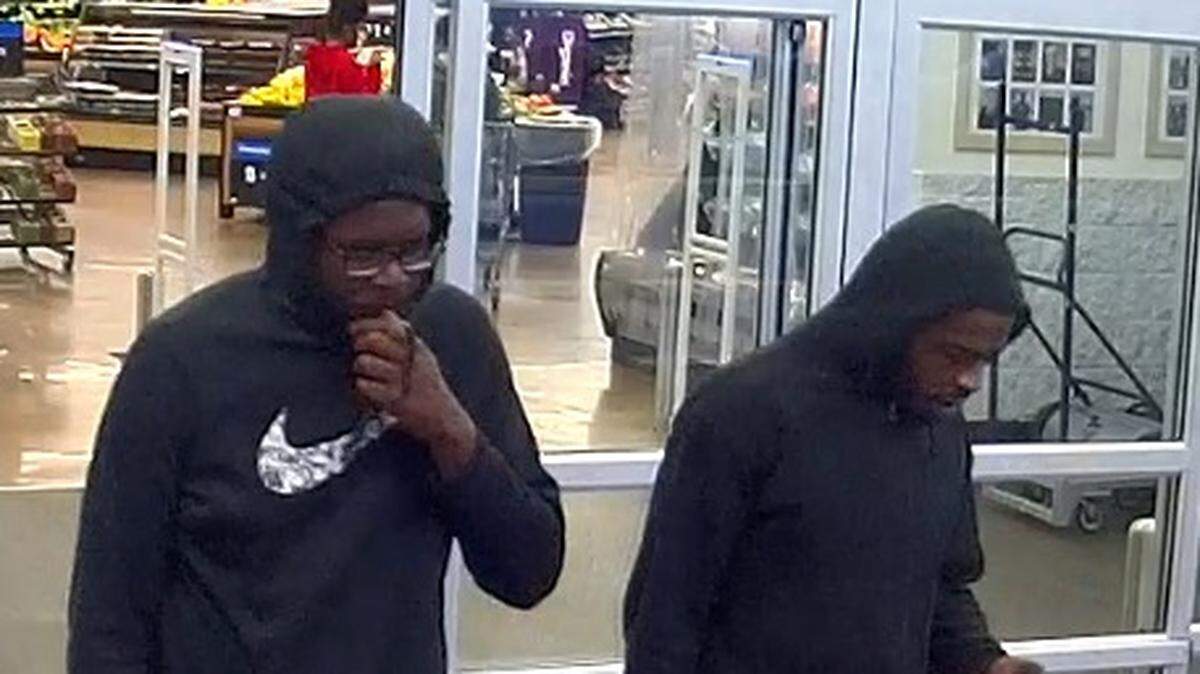 Police searching for two men using stolen credit card