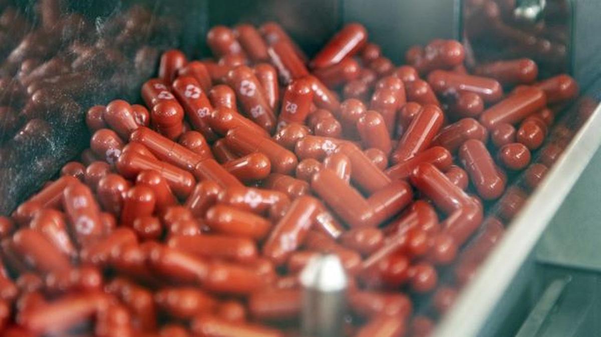 This undated image provided by Merck & Co. shows its new antiviral medication. The pharmaceutical company said Friday that its experimental COVID-19 pill reduced hospitalizations and deaths by half in people recently infected with the coronavirus and that it would soon ask health officials in the U.S. and around the world to authorize its use. (Merck & Co. via AP)