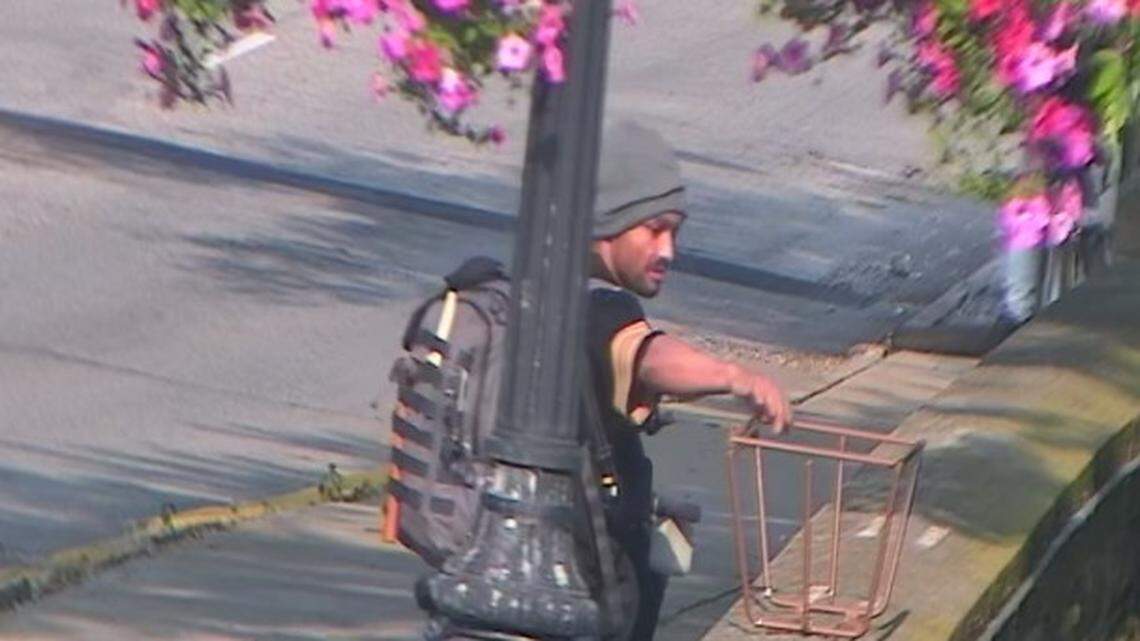 Video captured unknown individuals stealing several metal frames.