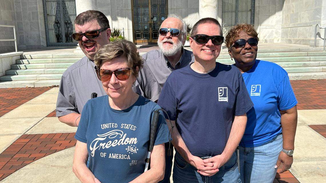 (Front, from left): Patty Poorman and Mike Muder. (Back, from left): Erik Stovall, Mike Bosela and Otho Mae Braziel.