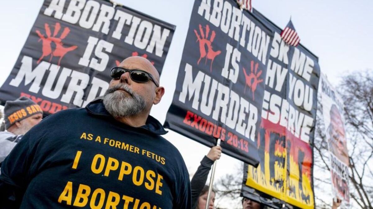 Anti-abortion protesters surround abortion rights advocates as both groups demonstrate in front of the U.S. Supreme Court on Wednesday, Dec. 1, 2021, in Washington. (Andrew Harnik | AP Photo)