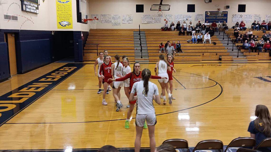United High School’s Addy Blazer prepares to inbound the basketball as Columbiana’s Megan Moser defends during Monday night’s key Eastern Ohio Athletic Conference game at United.