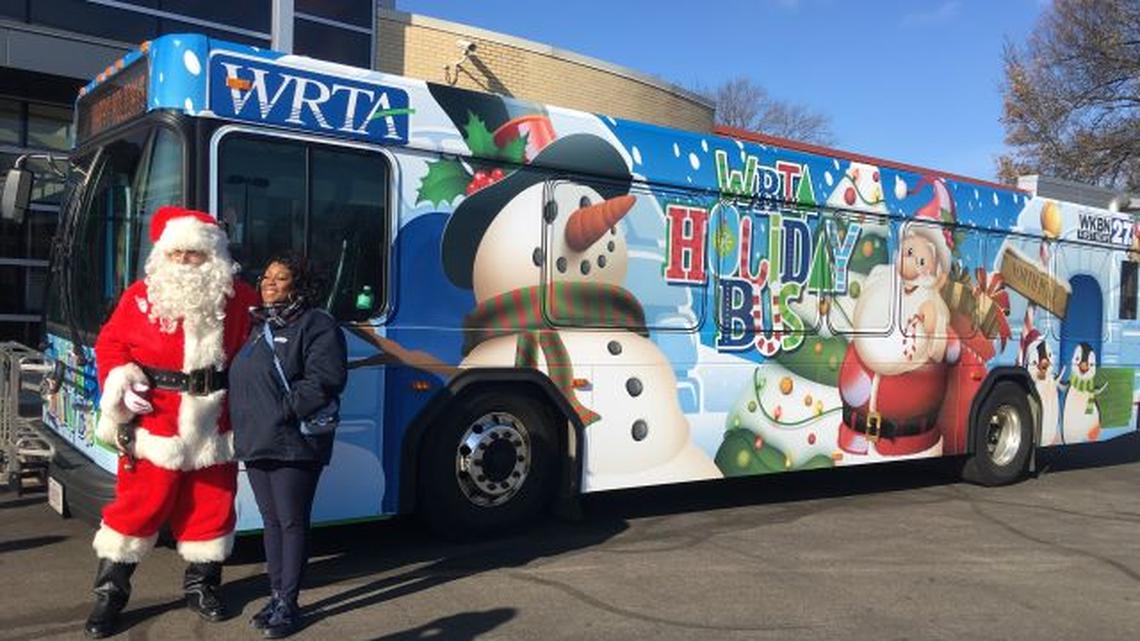 Western Reserve Transit Authority’s Holiday Bus made its 2019 debut at the Newport branch of the Public Library of Youngstown & Mahoning County with a special passenger on-board: Santa Claus. (Contributed photo)
