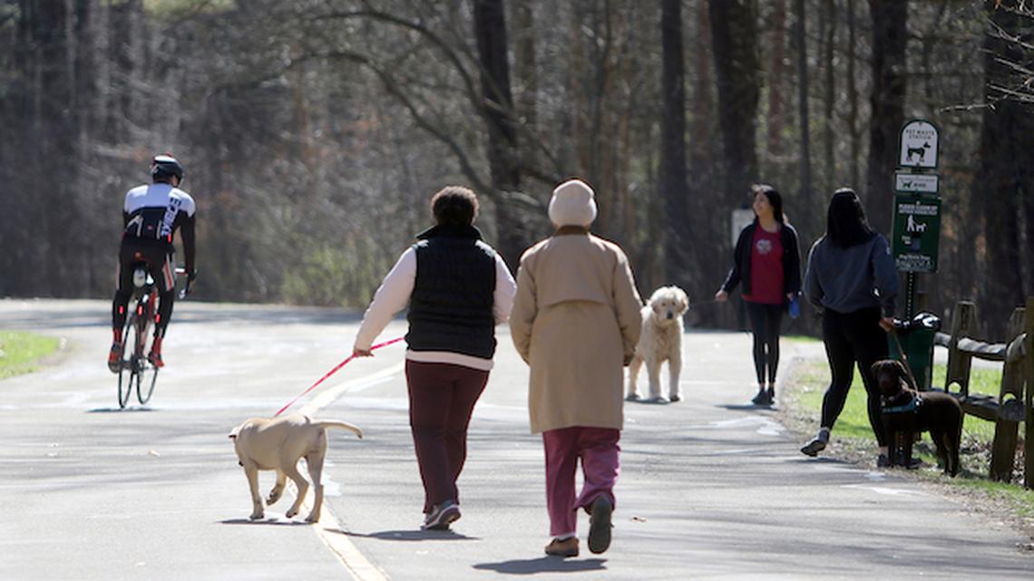 On on a sunny Thursday with temperatures in the mid-50s, this area of Mill Creek MetroParks in Boardman, on East Golf Drive, saw many people on bikes and others walking their dogs. (Bob Yosay/Mahoning Matters)