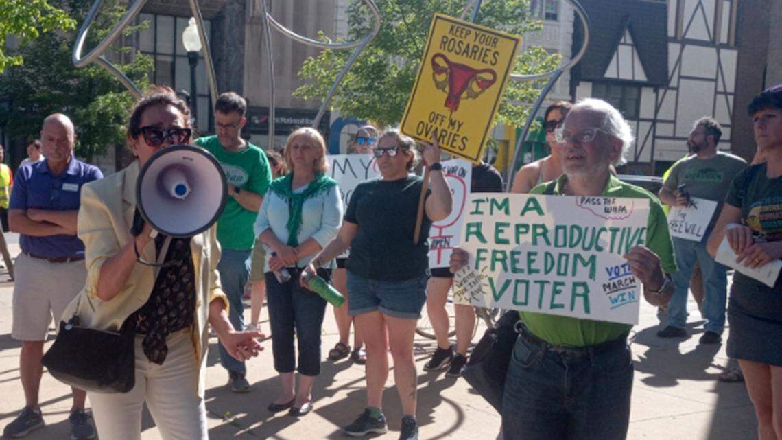 State Rep. Michele Lepore-Hagan of Youngstown, D-58th, uses a bullhorn to address protesters who rallied Friday, June 24, 2022, at the corner of Federal and Market streets in downtown Youngstown against the U.S. Supreme Court’s decision to overturn Roe v. Wade, ending Americans’ nearly 50-year-old constitutional right to abortion.