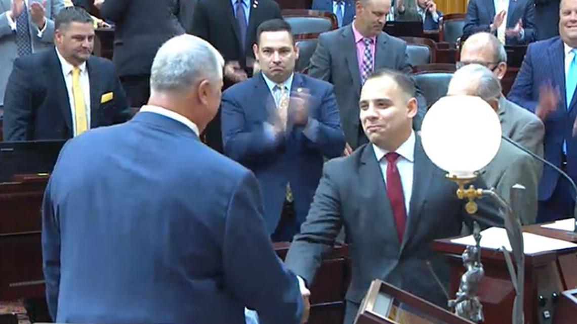 Newly appointed Ohio 59th District State Rep. Alessandro "Al" Cutrona, right, shakes hands with Ohio House Speaker Larry Householder, left, after being sworn in on the Ohio House floor on Thursday, May 28, 2020. (Ohio Channel)
