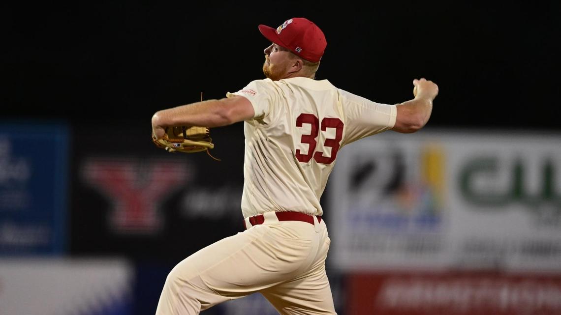 Travis Perry fires a pitch during Friday’s game against Memphis. The Penguins won 6-2.