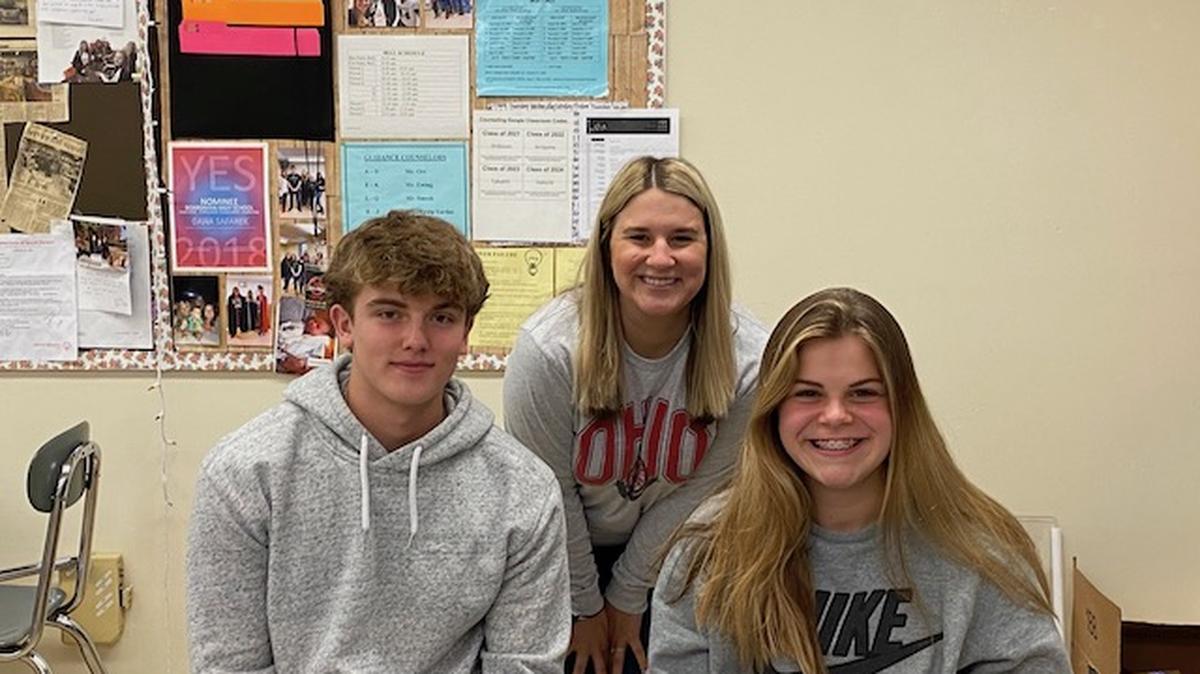 Boardman High School English teacher Dana Safarek, center, applied for and won a Herren Project Grant. The money will be used to start a library of books that deal with addiction. Also pictured are students AJ Nigro and Emily Yurko. (Contributed photo)