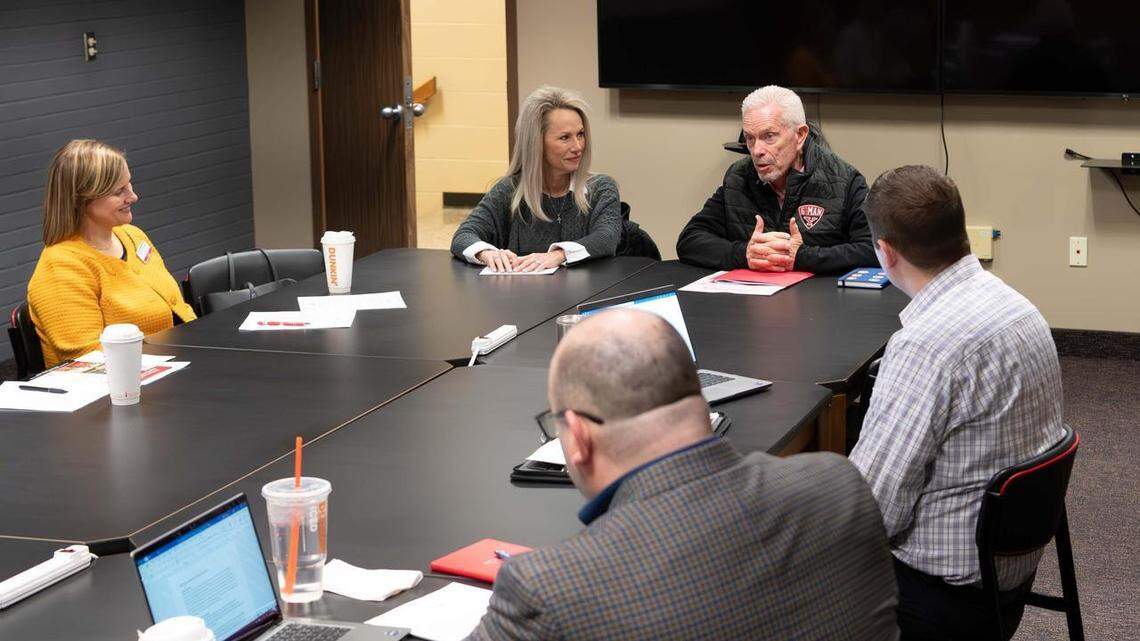 Youngstown State President Bill Johnson speaks during a meeting with a student group.