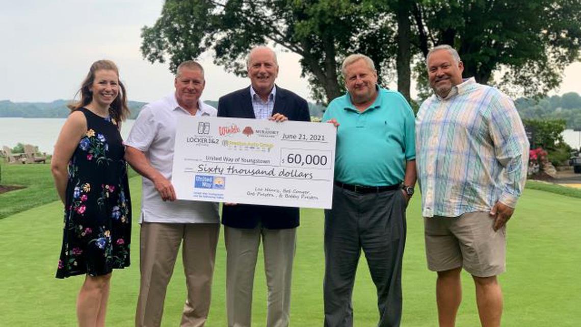 From left, Roxann Sebest of the United Way of Youngstown and the Mahoning Valley; Leo Henry of The Muransky Companies; Bob Hannon, president of the United Way of Youngstown and the Mahoning Valley; Bob Conger of Winkle Electric Co. Inc; and Chris Sammartino of The Muransky Companies. (Contributed photo)