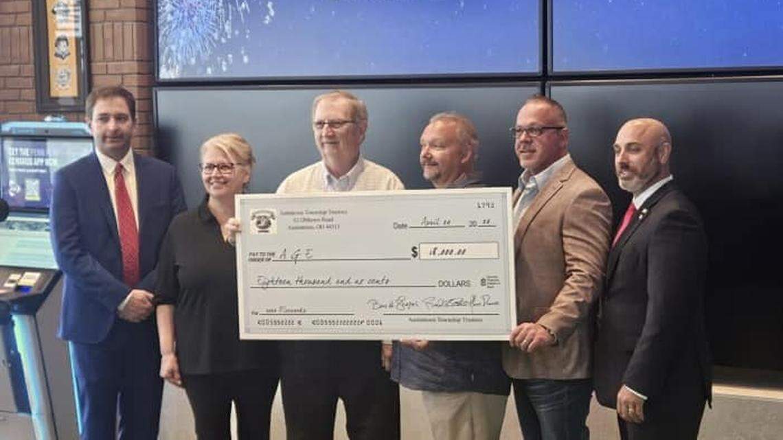 Austintown Township administrator Mark D’Apolito, trustee Monica Deavers, AGE Treasurer Ken Cooley, AGE President Mark Cole, trustee Bruce Shepas and trustee Robert Santos.