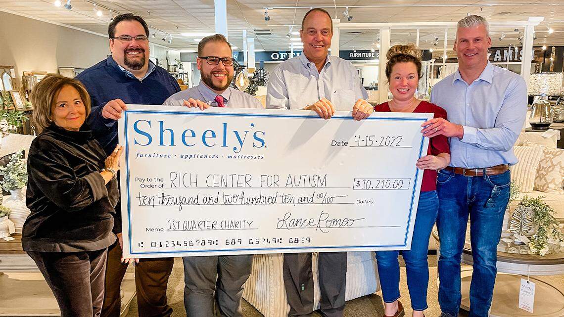 From left are Phyllis Ricchiuti, co-founder and board president of the Rich Center for Autism; Michael J. Latessa, associate director of development at the Rich Center; Gregory V. Boerio, executive director of the Rich Center; Jeff Curry, general manager and principal owner of Sheely’s Furniture and Appliance; Jessica Smith, principal owner of Sheely’s; and Lance Romeo, buyer and principal owner of Sheely’s.