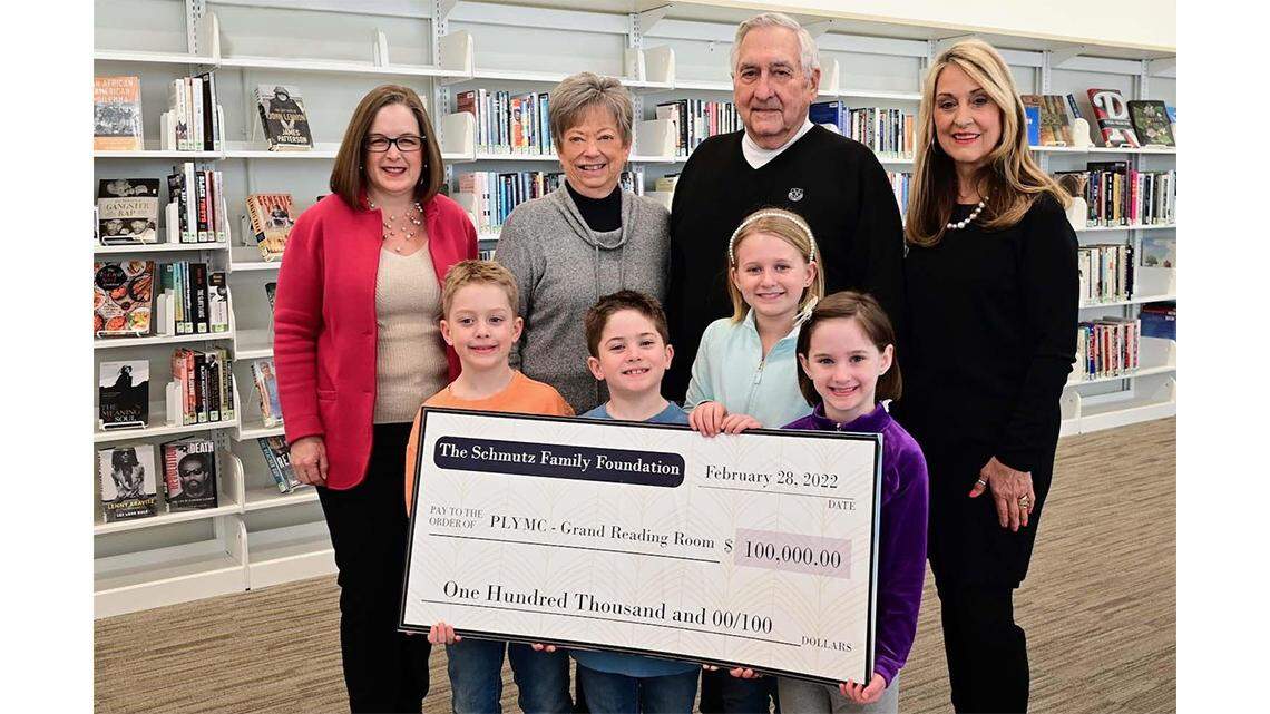 Back row, from left: Aimee Fifarek, executive director and CEO of the Public Library of Youngstown & Mahoning County; Judy and Reid Schmutz of The Schmutz Family Foundation; and Debbie Liptak, development director at the PLYMC. Front row, from left: Eddie, Charlie, Mallory and Ali Maughan.