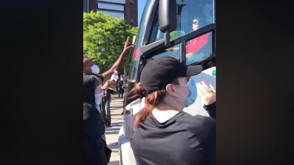 Shown here is a screen capture of video taken during an encounter between protesters marching down Fifth Avenue in Youngstown on May 31, 2020, and the driver of a Baron's Bus Lines motorcoach near the West Commerce Street intersection. (Facebook)
