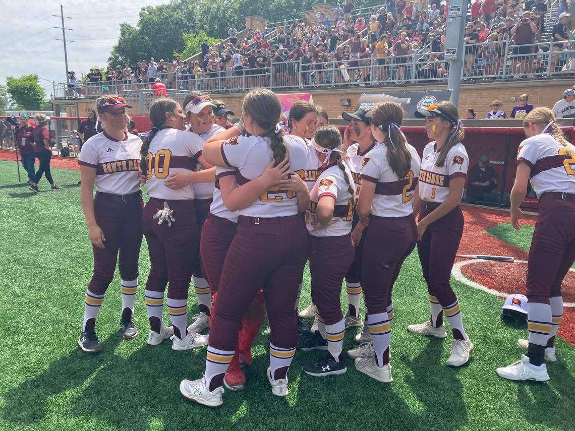 South Range softball players console each other after a 5-3 loss to Liberty Union Saturday in a state semi-final contest.