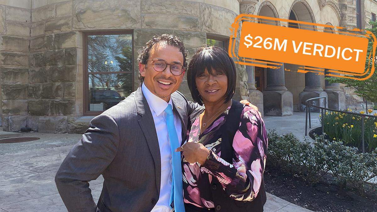 Michael Hill (left) from Eadie Hill Trial Lawyers and Rita Stanton (right), Stephen Tate’s sister and representative