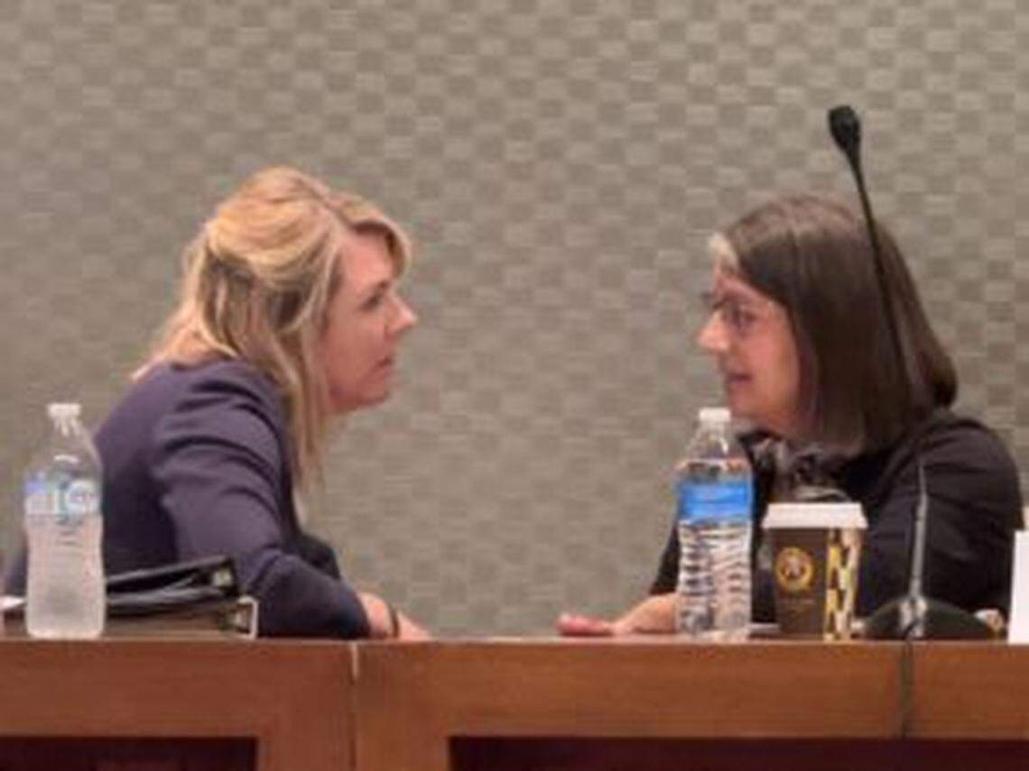 House Minority Leader Allison Russo, left, talks with Senate Minority Leader Nickie Antonio, as they await the start of the Sept. 13, 2023, Ohio Redistricting Commission meeting.