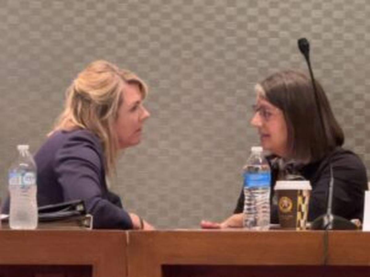 House Minority Leader Allison Russo, left, talks with Senate Minority Leader Nickie Antonio, as they await the start of the Sept. 13, 2023, Ohio Redistricting Commission meeting.