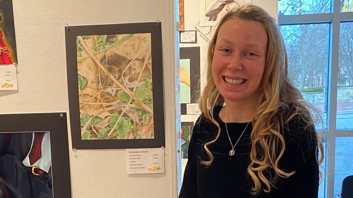 West Branch junior Brynn Smith with her colored pencil drawing that received a Gold Key Award at the Northeastern Ohio Scholastic Art Exhibition in January.