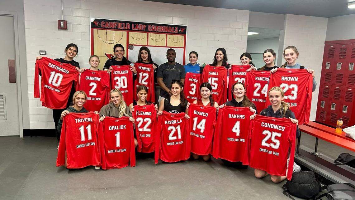 Business owner supports Canfield High School basketball with warm-up jerseys