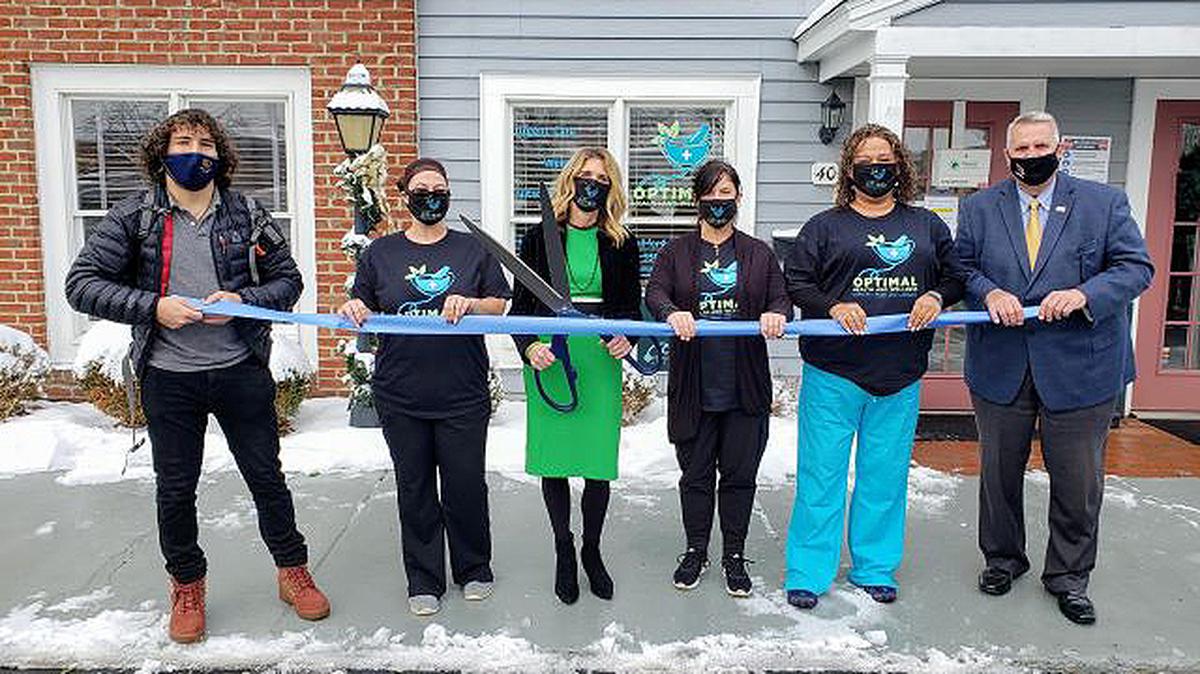 Optimal Health and Wellness, 584 E. Main St., Canfield, had a ribbon-cutting ceremony and open house Thursday. From left are Dominic Cooper, marketer; Jessica Chapman, receptionist; Suzanne Cavalier, owner; Colleen Finn, health educator; Tiffany Allen, medical assistant; and Canfield Mayor Richard Duffett. (Contributed photo)