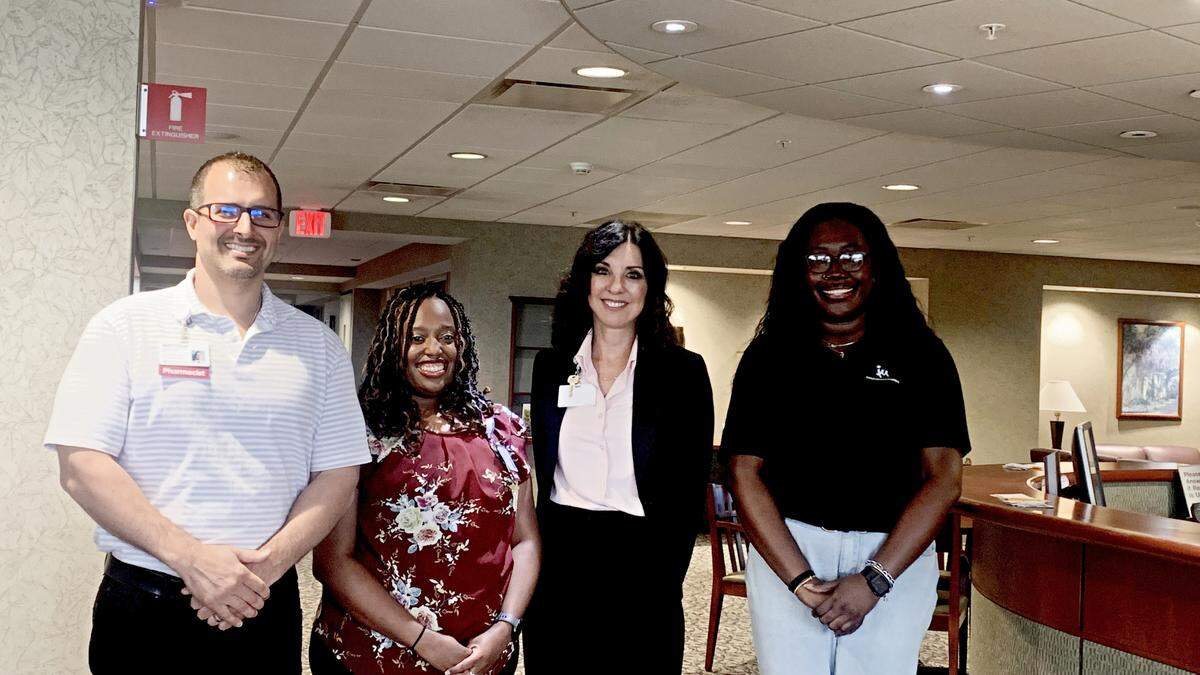 (left to right) Mercy Health pharmacists Matthew Tricomi and Choniece Phillips with Angie Massacci, director of perioperative services at St. Joseph Warren Hospital and Jalaya Provitt from Inspiring Minds.