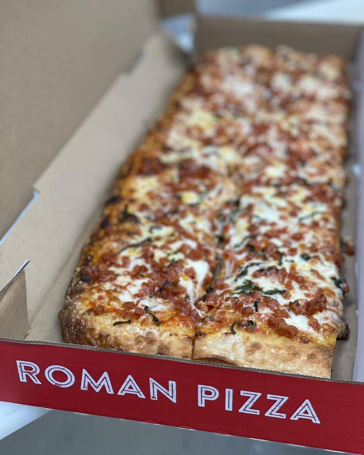 Mandi Hopkins, manager of Risi Pizzeria & Italian Cuisine in Canfield, said the Roman-style dough is unique to their restaurant. 