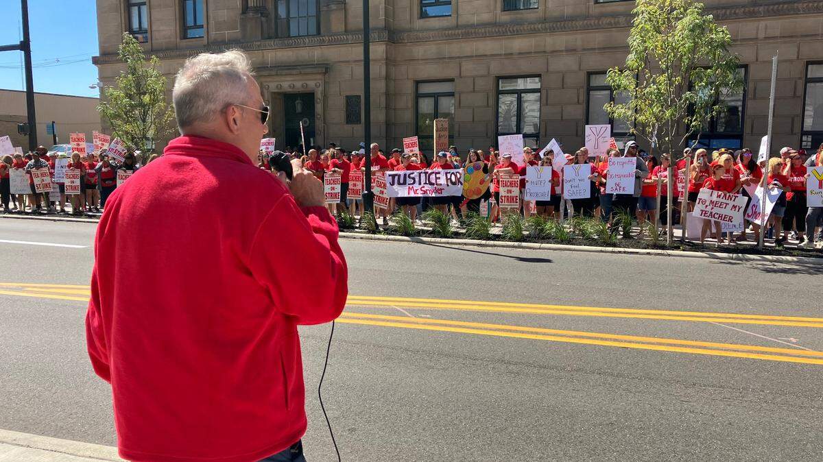 Ohio Education Association Vice President Jeff Wensing speaks to about 250 at a rally Thursday morning.